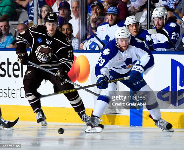 Connor Brown of the Toronto Marlies battles for the puck with Aaron Ness of the Hershey Bears during AHL Eastern Conference Final playoff game action...