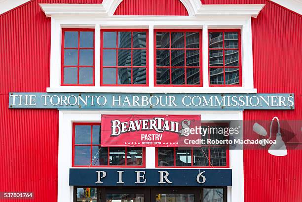 BeaverTails store entrance at the Toronto Harbour Commissioners bulding or Pier 6. The pastry is traditional Toronto sweet. The building is the...