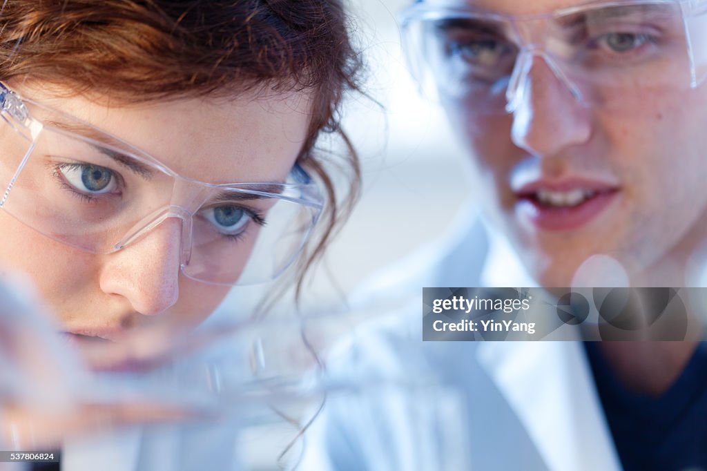Close-up of Research Scienctists Chemists Working in Laboratory Horizontal