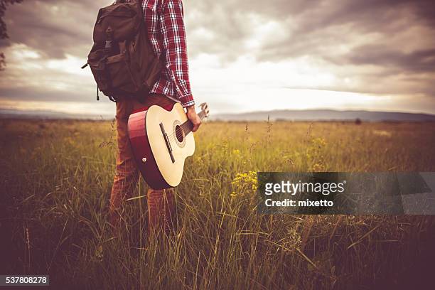 music and nauture - folk musician stock pictures, royalty-free photos & images