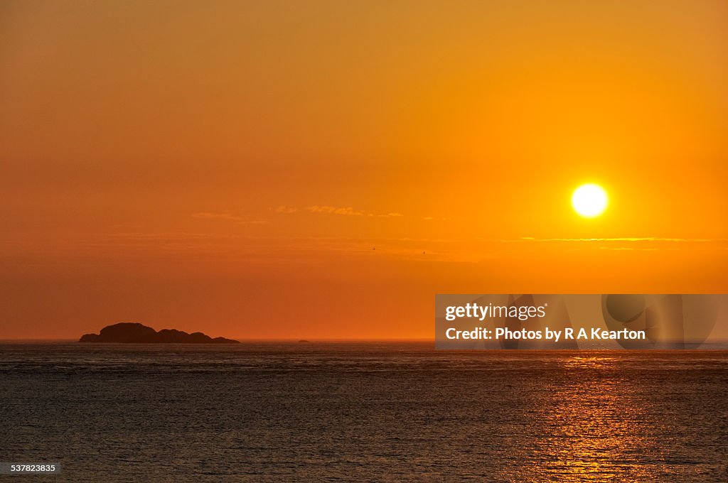 Deep gold sunset over the sea