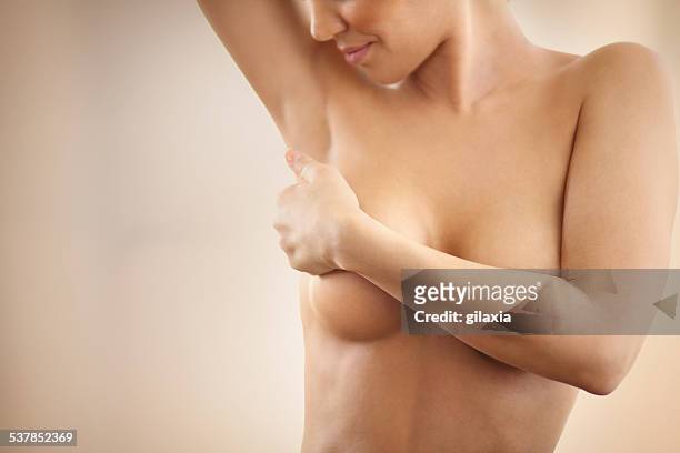 breast self exam. - borstkas stockfoto's en -beelden