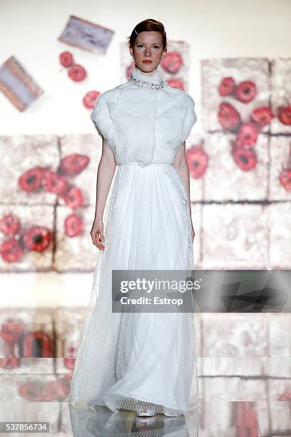 Model walks the runway at Jesus Peiro designed by Merche Segarra bridal fashion Season 2017 show during 'Barcelona Bridal Fashion Week 2016' on April...