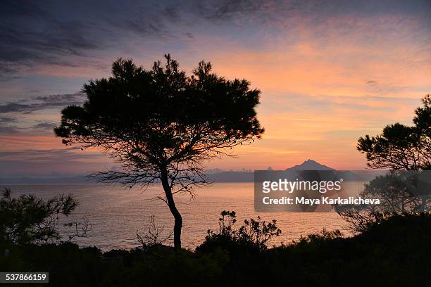dawn at sithonia coastline with view of mt athos - thessaloniki stock pictures, royalty-free photos & images