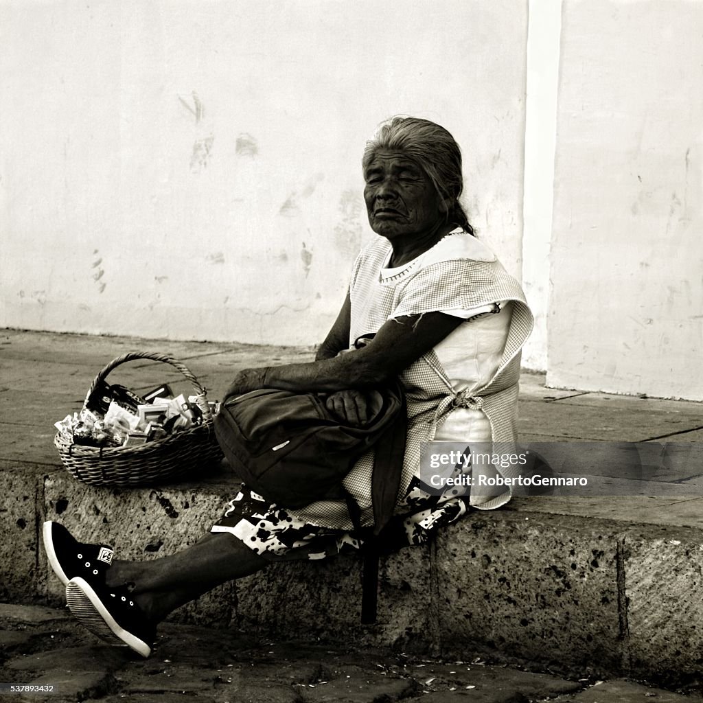 Mayan woman cigarette street vendor Oaxaca Mexico BW