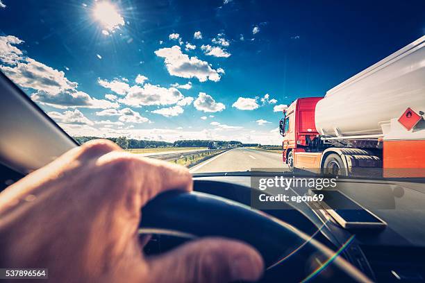 driving car - cisternae stock pictures, royalty-free photos & images