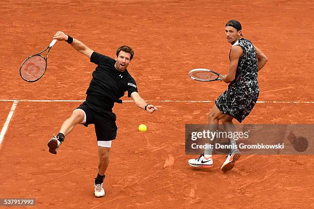 Lukasz Kubot of Poland and Alexander Peya of Austria in action during the Men's Doubles semi final match against Mike Bryan and Bob Bryan of the...