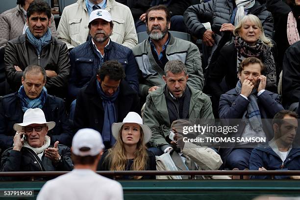 Former international football player Eric Cantona and his brother Jean-Marie Cantona , Joel Cantona , Renaud Capucon , Renaud Lavillenie attend the...