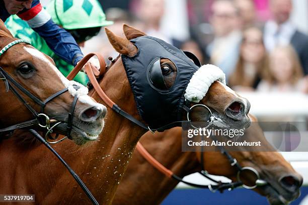 Jimmy Fortune riding Tullius win The Investec Diomed Stakes at Epsom Racecourse on June 3, 2016 in Epsom, England.