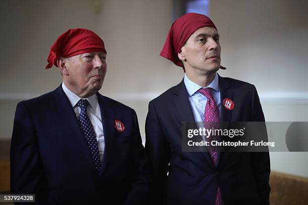 Former Labour minister David Miliband and Alan Johnson MP take part in a community meeting at Ramgarhia Sikh Temple in Birmingham as the MP's...