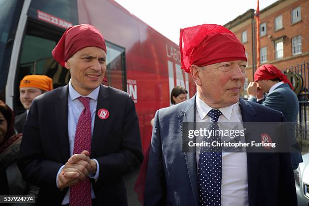 Former Labour minister David Miliband and Alan Johnson MP take part in a community meeting at Ramgarhia Sikh Temple in Birmingham as the MP's...