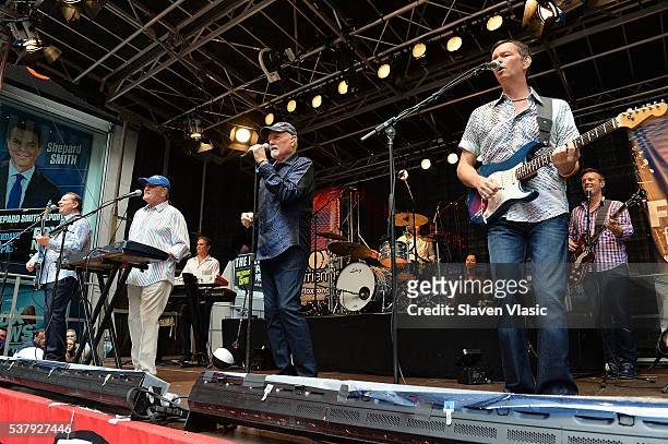 Jeffrey Foskett, Bruce Johnston, Mike Love and Scott Totten of The Beach Boys perform during "FOX & Friends" All American Concert Series outside of...