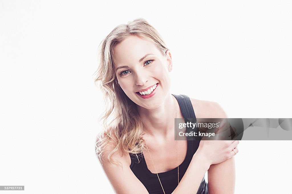 Beautiful happy young woman laughing