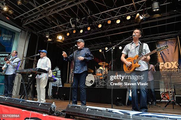 Jeffrey Foskett, Bruce Johnston, Mike Love and Scott Totten of The Beach Boys perform during "FOX & Friends" All American Concert Series outside of...