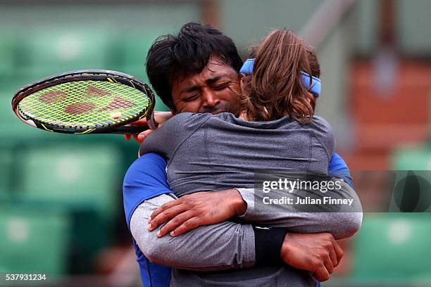 Martina Hingis of Switzerland and Leander Paes of India celebrate victory during the Mixed Doubles final match against Sania Mirza of India and Ivan...