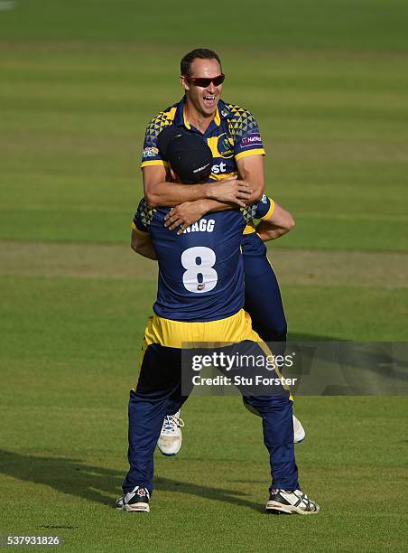 Glamorgan bowler Dean Cosker celebrates with fielder Graham Wagg after dismissing Hampshire batsman Jimmy Adams during the NatWest T20 Blast match...