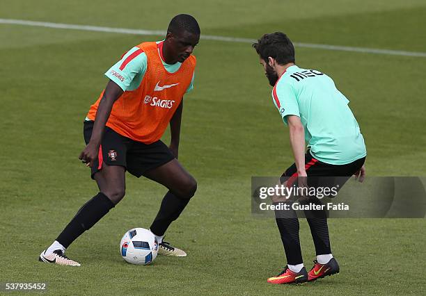 Portugal's midfielder William Carvalho with Portugal's forward Rafa Silva in action during Portugal's National Team Training session in preparation...