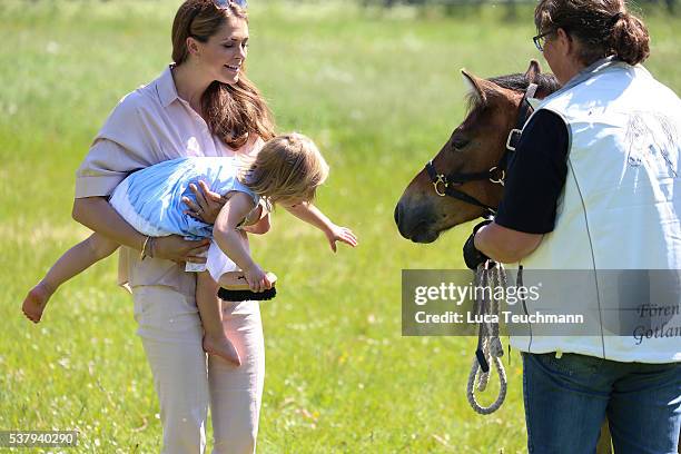 Princess Leonore of Sweden and her mother Princess Madeleine of Sweden are seen visiting the stables on June 3, 2016 in Gotland, Sweden. Duchess...