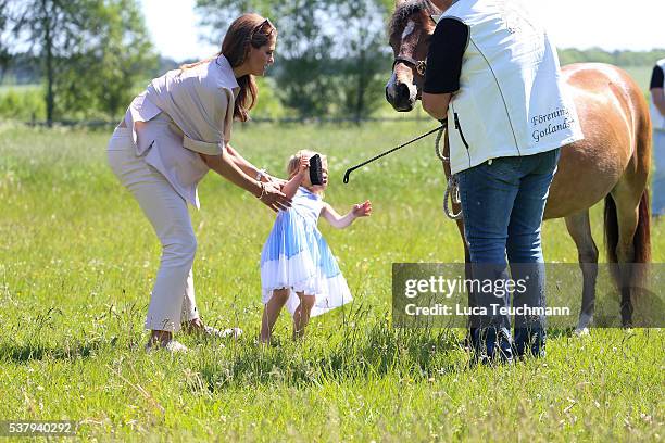 Princess Leonore of Sweden and her mother Princess Madeleine of Sweden are seen visiting the stables on June 3, 2016 in Gotland, Sweden. Duchess...