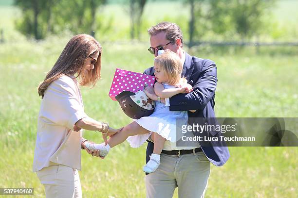 Princess Leonore of Sweden and her mother Princess Madeleine of Sweden and Christopher O'Neil are seen visiting the stables on June 3, 2016 in...