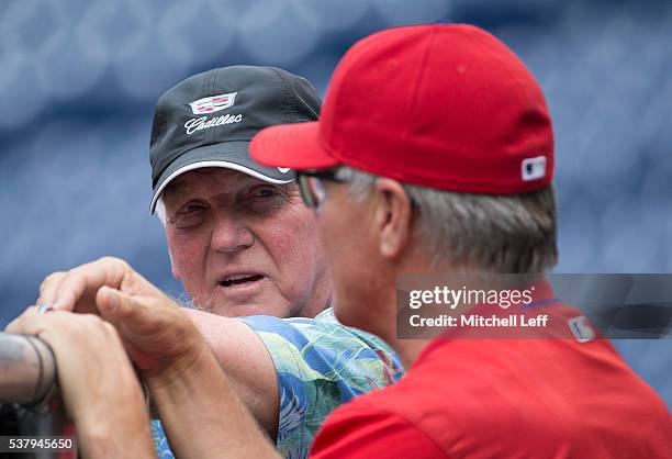 Former Philadelphia Phillies manger Charlie Manuel talks to current Philadelphia Phillies manager Pete Mackanin prior to the game against the...