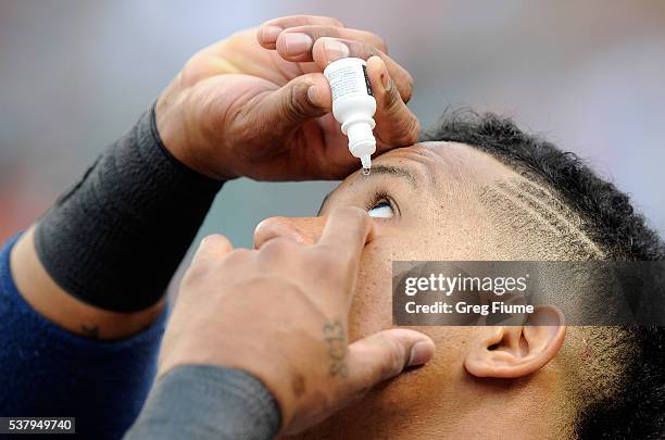 Starlin Castro of the New York Yankees puts in eyedrops before the game against the Baltimore Orioles at Oriole Park at Camden Yards on June 3, 2016...