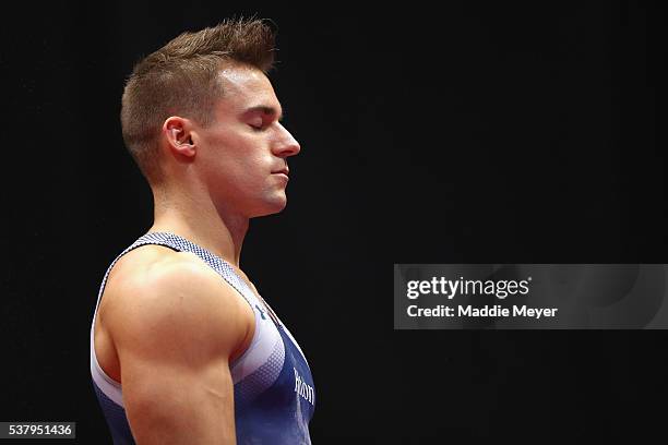 Sam Mikulak prepares to compete in the pommel horse during the Men's P&G Gymnastics Championships at the XL Center on June 3, 2016 in Hartford,...