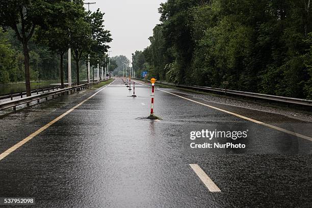 Illustration picture shows the N80 being closed down from traffic because of floods in Alken, Limburg, Belgium on June 3, 2016.