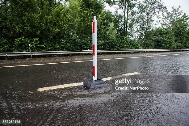 Illustration picture shows the N80 being closed down from traffic because of floods in Alken, Limburg, Belgium on June 3, 2016.