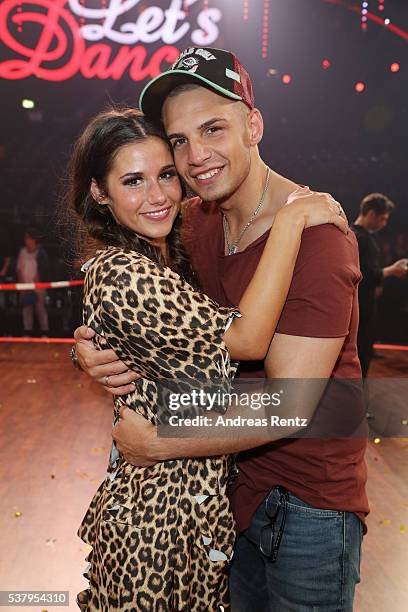 Sarah Lombardi and her husband Pietro Lombardi smile after the final show of the television competition 'Let's Dance' on June 3, 2016 in Cologne,...