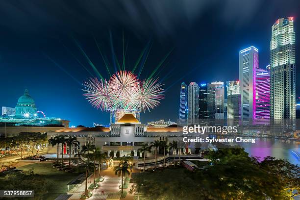 fireworks over singapore parliament house - canberra stock-fotos und bilder