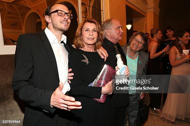 Senta Berger and husband Michael Verhoeven and her son Luca Verhoeven with award and sister of Michael Verhoeven, Monika Ring Verhoeven during the...