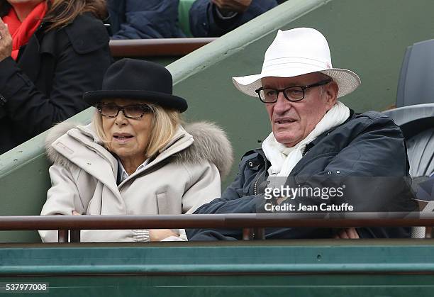 Mireille Darc and her husband Pascal Desprez attend day 13 of the 2016 French Open held at Roland-Garros stadium on June 3, 2016 in Paris, France.