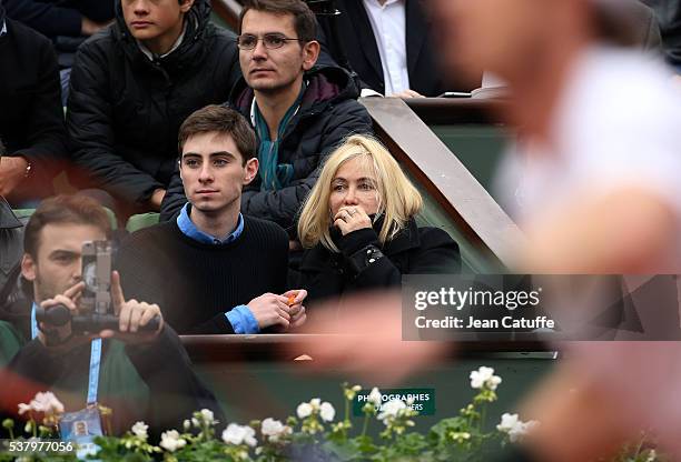 Emmanuelle Beart and her son Yohann Moreau attend day 13 of the 2016 French Open held at Roland-Garros stadium on June 3, 2016 in Paris, France.