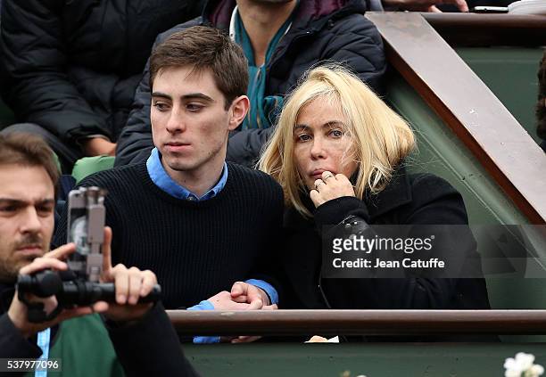 Emmanuelle Beart and her son Yohann Moreau attend day 13 of the 2016 French Open held at Roland-Garros stadium on June 3, 2016 in Paris, France.