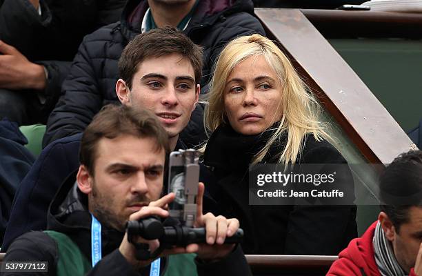 Emmanuelle Beart and her son Yohann Moreau attend day 13 of the 2016 French Open held at Roland-Garros stadium on June 3, 2016 in Paris, France.