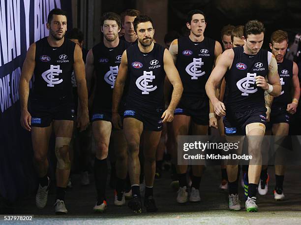 Kade Simpson of the Blues leads the team out at half time during the round 11 AFL match between the Carlton Blues and the Brisbane Lions at Etihad...