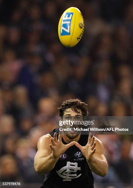 Levi Casboult of the Blues marks the ball during the 2016 AFL Round 11 match between the Carlton Blues and the Brisbane Lions at Etihad Stadium on...