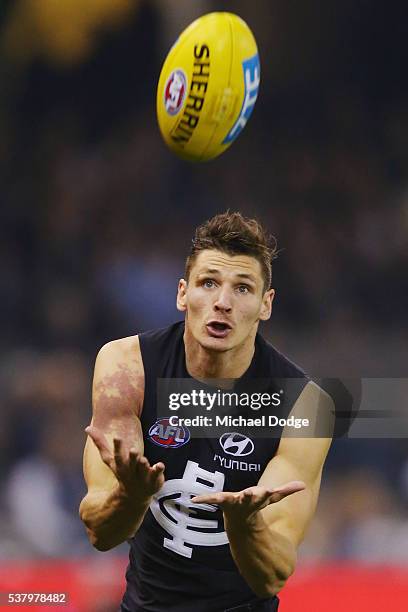 Andrejs Everitt of the Blues marks the ball during the round 11 AFL match between the Carlton Blues and the Brisbane Lions at Etihad Stadium on June...