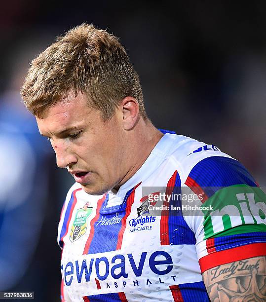 Trent Hodkinson of the Knights looks dejected after losing the round 13 NRL match between the North Queensland Cowboys and the Newcastle Knights at...