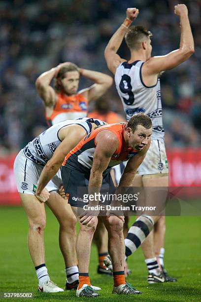 Steve Johnson of the Giants puts his hands on his knees after the final siren during the round 11 AFL match between the Geelong Cats and the Greater...