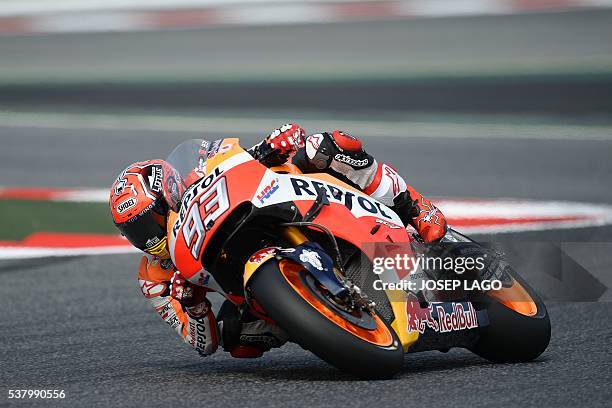 Repsol Honda Team's Spanish rider Marc Marquez rides in the chicane included in the racetrack, due to yesterday Spanish rider Luis Salom's fatal...