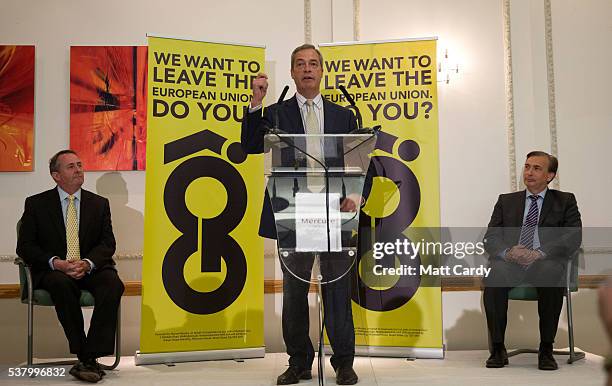 Former Defence Secretary Liam Fox listens as UKIP leader Nigel Farage speaks at a Grassroots Out! campaign rally at the Mercure Bristol Grand Hotel...