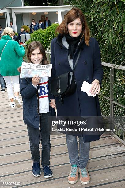 Actress Valerie Donzelli and her daughter Rebecca attend Day Fourteen, Women single's Final of the 2016 French Tennis Open at Roland Garros on June...