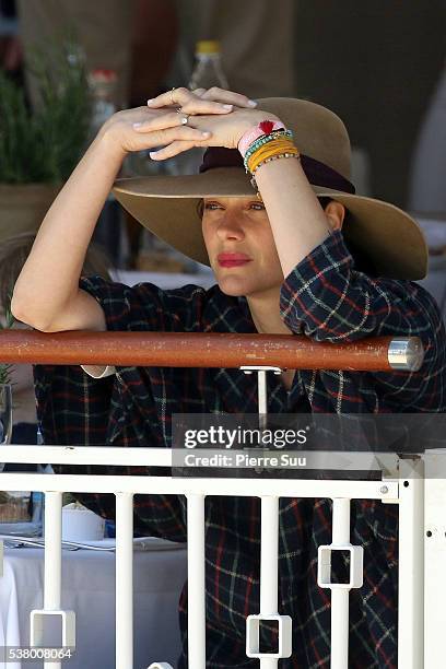 Marion Cotillard watches her husband Guillaume Canet competing at the Longines Athina Onassis Horse Show on June 4, 2016 in Saint-Tropez, France.