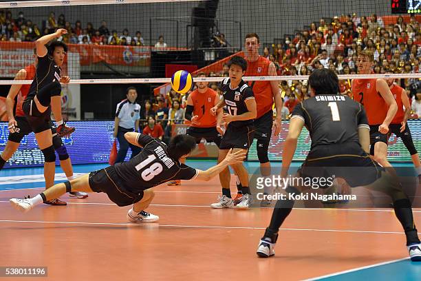 Yuta Yoneyama of Japan receives the ball during the Men's World Olympic Qualification game between Japan and Canada at Tokyo Metropolitan Gymnasium...
