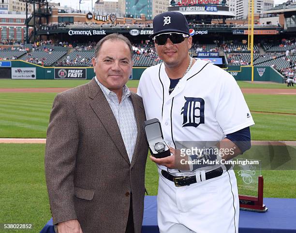 Detroit Tigers Executive Vice President of Baseball Operations and General Manager Al Avila presents Victor Martinez with his American League Player...