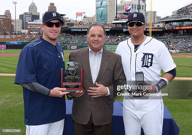 Detroit Tigers Executive Vice President of Baseball Operations and General Manager Al Avila presents Jordan Zimmermann with his American League...