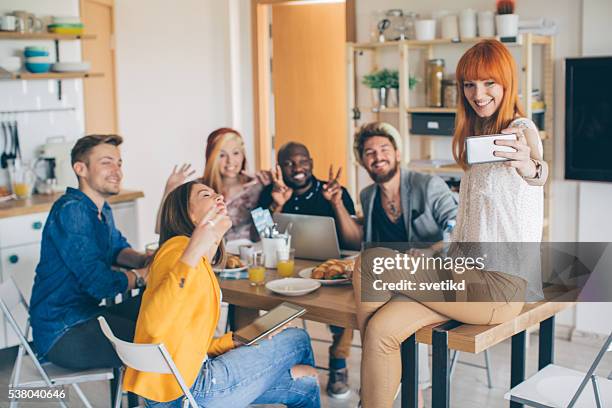 selfie with new roommates - roommate stock pictures, royalty-free photos & images