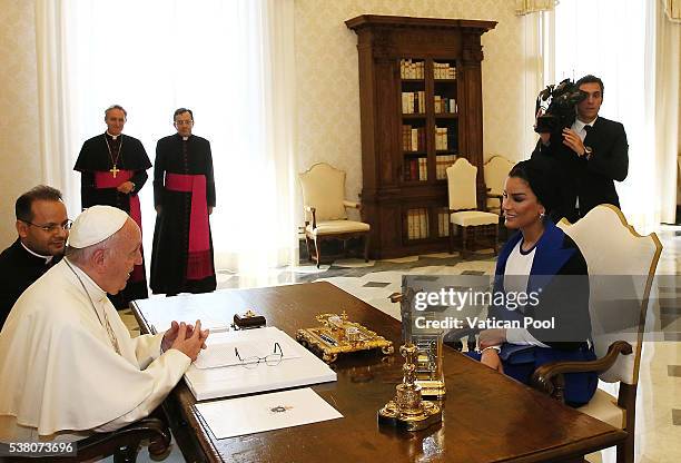 Pope Francis meets Sheikha Mozah bint Nasser Al Missned at his private library in the Apostolic Palace on June 4, 2016 in Vatican City, Vatican. Her...